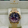 Rolex GMT Master II Gold Purple Dial Watch