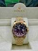 Rolex GMT Master II Gold Purple Dial Watch