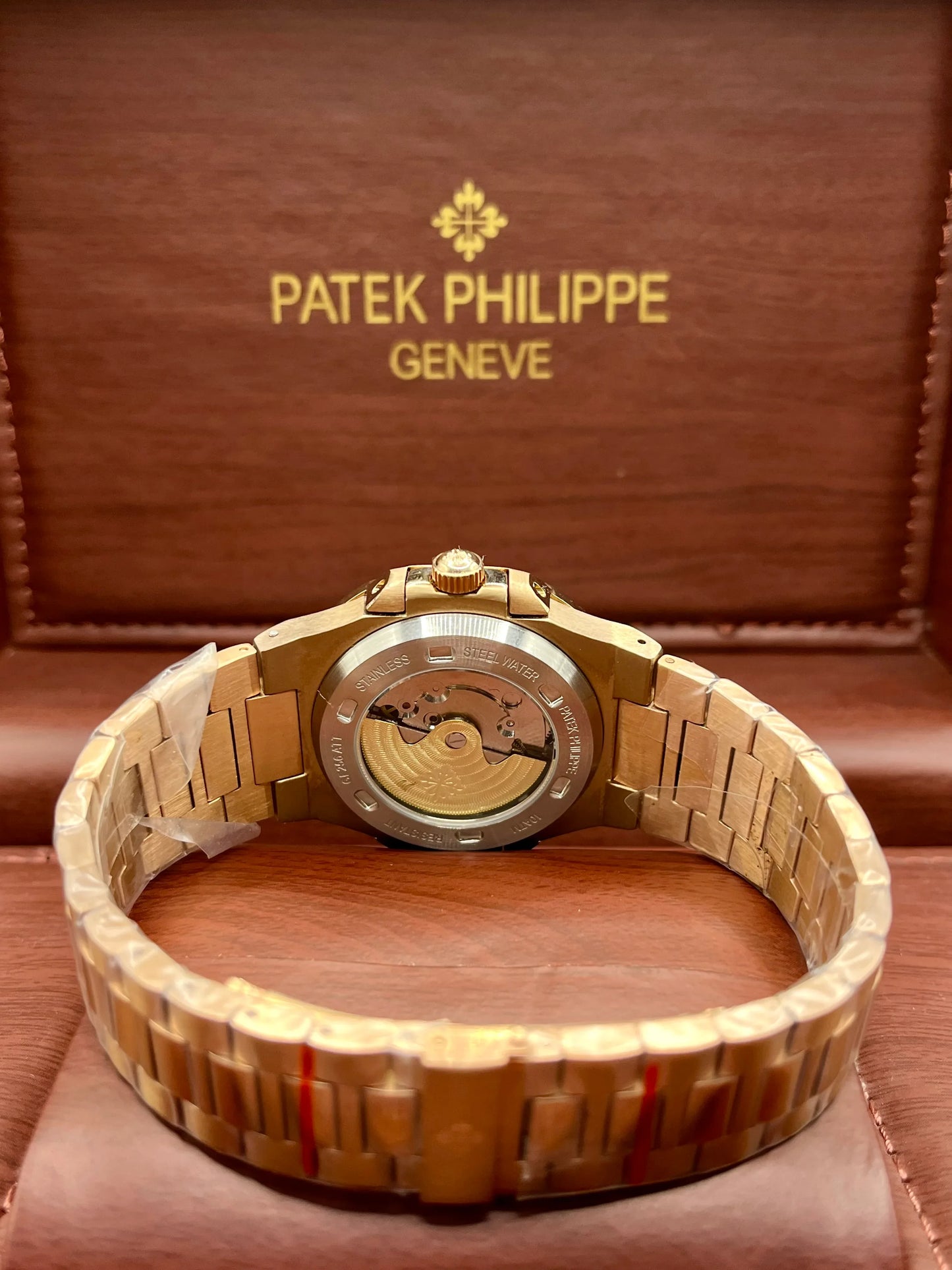Patek Philippe Nautilus Green Bezel Gold Watch
