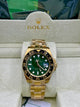 Rolex GMT Master II Gold Green Dial Watch